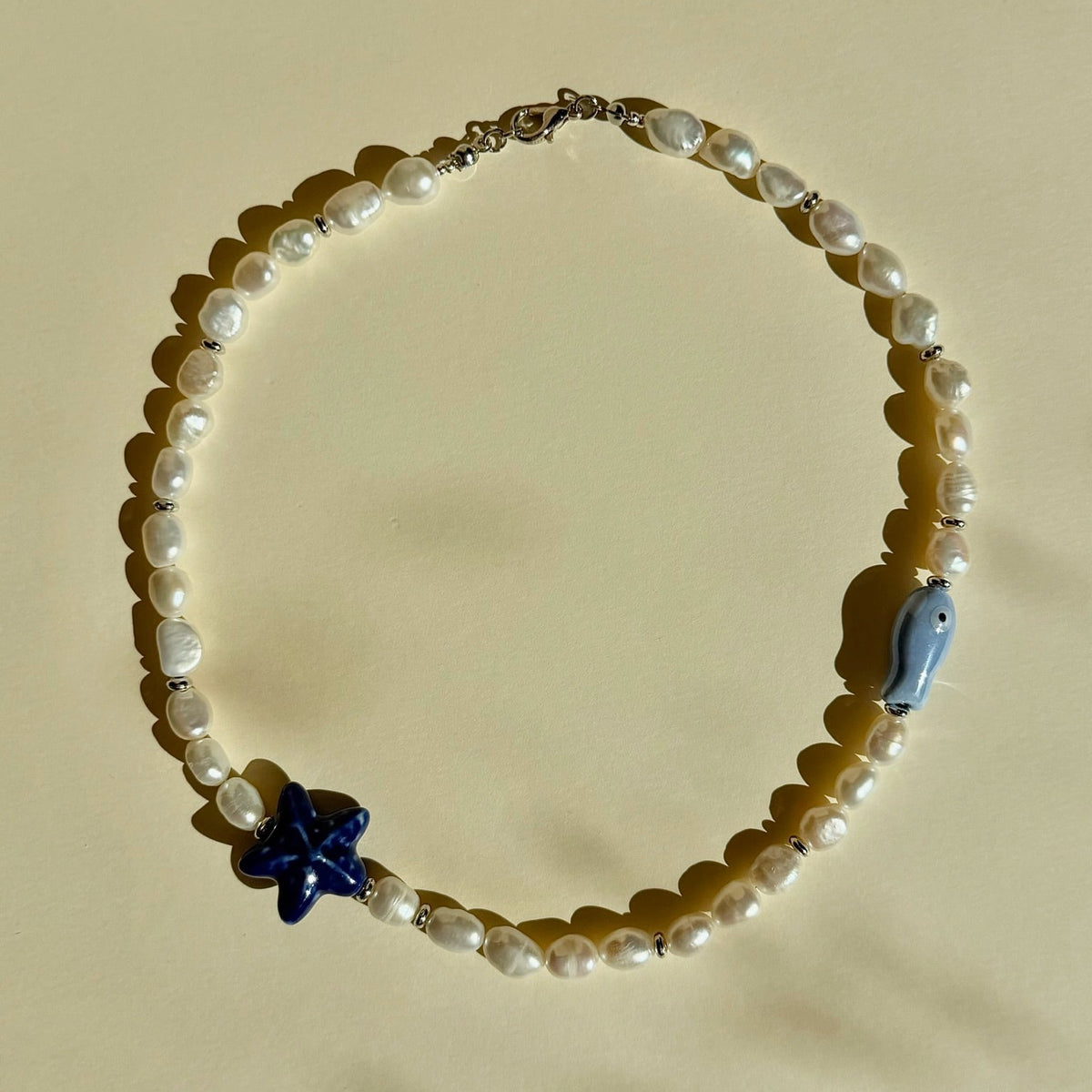 Navy Pearl Star Kaklo Vėrinys
