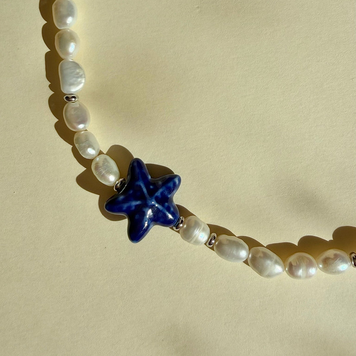 Navy Pearl Star Kaklo Vėrinys