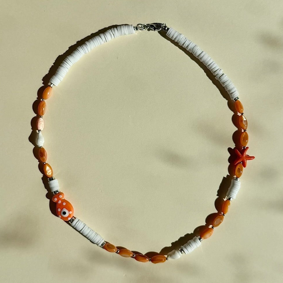 Orange Reef Kaklo Vėrinys